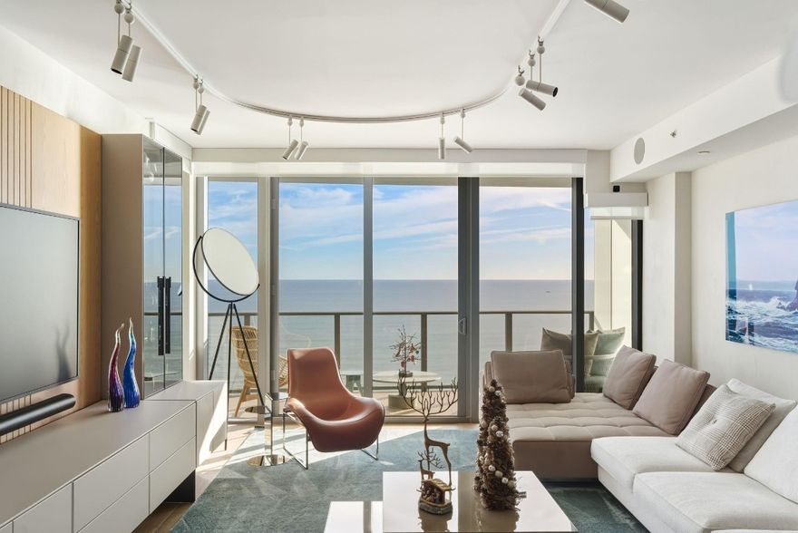 Designer-curated North East Corner residence! This sought-after floor plan features 3 beds, 3.5 baths plus den, offered turnkey fully furnished, designed by Aitken Studio with Italian furnishings by Minotti & Flexform, KETTAL outdoor pieces, and custom lighting by FLOS. Bespoke millwork, custom closets and window treatments throughout.  Floor-to-ceiling glass open to expansive sunrise and sunset balconies. Italian kitchen cabinets with porcelain countertops, Wolf & Sub-Zero appliances, gas range, wine fridge, and espresso machine. Smart home automation, integrated audio, Samsung Frame TVs, and private wine storage. Resort-style amenities include private beach with service, 2 pools, hot tub, fitness center, concierge, and 24/7 valet, minutes to dining, boat clubs, and Hillsboro Inlet.