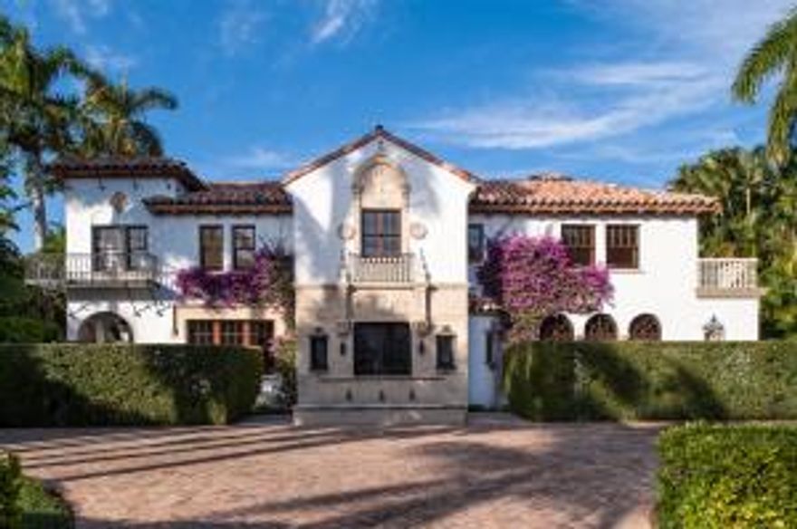 Spectacular Clarke Avenue In-Town grand Mediterranean. Beautifully renovated landmarked John Volk estate with 6BR/6.2BA, guest house, sunroom, elevator, chef's kitchen, family room, oversized multi-car garage, and living room with fireplace. Stunning peck y cypress ceilings, flooring, and detailing throughout estate. Loggias open to gorgeous backyard with pool, summer kitchen, fountain, and cabana.