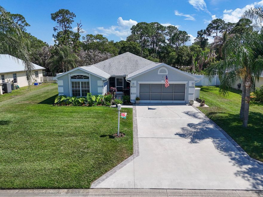 WOW!!  Spotless 3/2/2 POOL home in desirable Oleander Pines.  Large, airy rooms, huge Master BR overlooks pool, ensuite with separate soaking tub and updated shower, 2 sinks, HUGE walk-in closet.  Formal dining, eat-in kitchen, mudroom.  Screened, covered lanai  and landscaped private pool, fully fenced yard.  Screen garage door, screened front patio, accordion shutters.  Conveniently located near US1, lots of BOATING, shopping, restaurants, doctors, GOLF, hiking, kayaking, BEACHES. Minutes to Fort Pierce and Stuart, both unique walkable downtown areas.    THE best part - super LOW cost of living, with $150/YEAR HOA and COUNTY ONLY TAXES, plus well and septic saves a fortune on water bills.  Sprinkler system, accordion shutters, impact windows and doors (?)