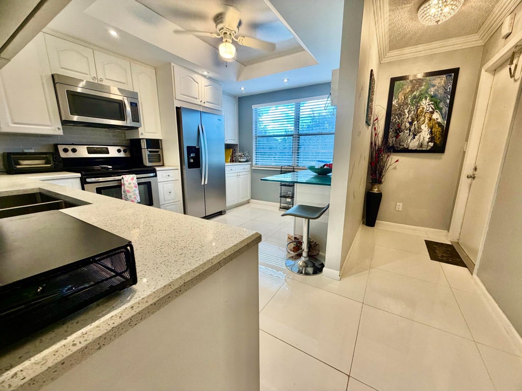 Photo of 4401 MARTINIQUE Court #H2, Coconut Creek, FL 33066 (MLS # B26082143)