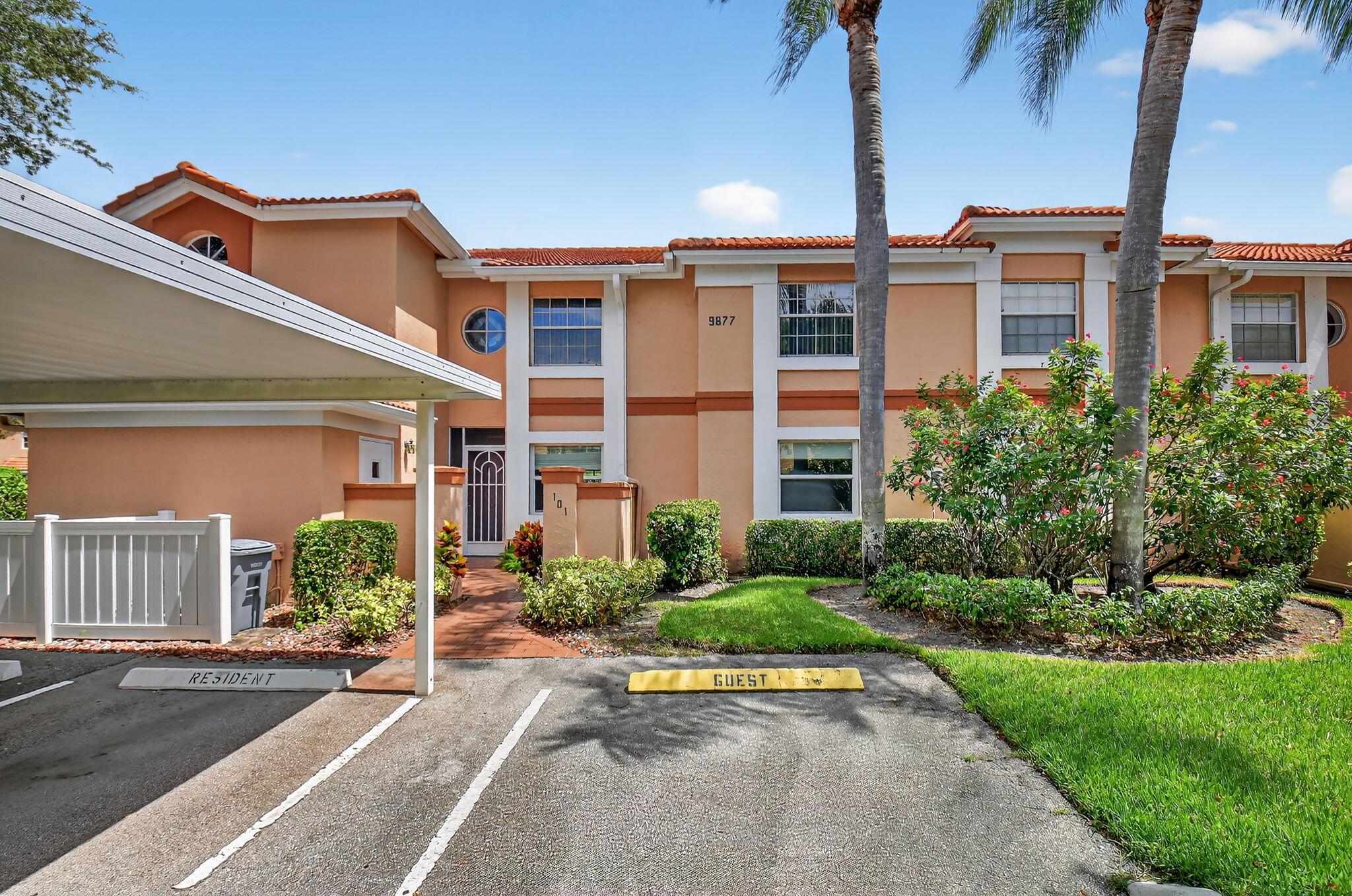 This immaculate 2-bedroom + den, 2-bath first-floor corner condo combines comfort, style, and serene lakefront living. Step inside and be captivated by floor-to-ceiling sliding glass doors, flooding the spacious living area with natural light and offering full views of the shimmering lake and surrounding nature. Move right in. This home is sold fully furnished, complete with all contents for effortless living or a seamless vacation retreat! All WINDOWS (except sliding glass doors) are HURRICANE IMPACT for peace of mind during storm season. Enjoy a kitchen remodeled with ample cabinetry, pull-out shelves, a dedicated coffee nook, and direct access to a side patio--ideal for outdoor grilling and entertaining. Both bathrooms have been tastefully renovated with contemporary finishes, ensuring