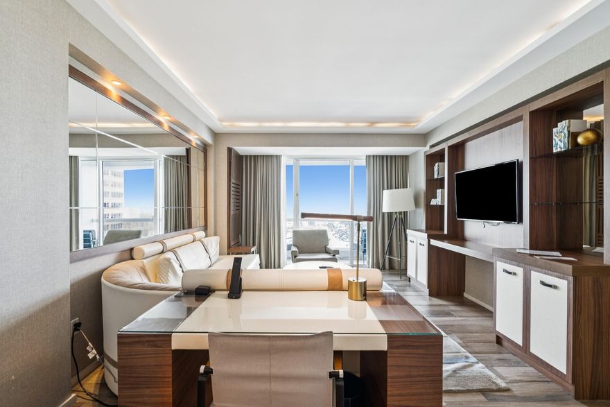 Experience elevated beachfront living at Conrad Fort Lauderdale Beach in this fully furnished 1BD/1.5BA residence with west exposure and sweeping Intracoastal and city views. Ideally positioned next to the Four Seasons Hotel and Residences Fort Lauderdale, this turnkey unit offers a gourmet kitchen with Sub-Zero & Wolf appliances, marble baths, and sophisticated finishes throughout. Enjoy five-star amenities including daily housekeeping, 24-hour valet, heated pool, spa, fitness center, dining, and concierge services. Pet-friendly with flexible rental options—participate in the hotel leaseback program with $42,960 guaranteed annual gross income and up to 30 days of owner use, or opt out and self-manage for enhanced income potential. Perfect for personal enjoyment or investment.