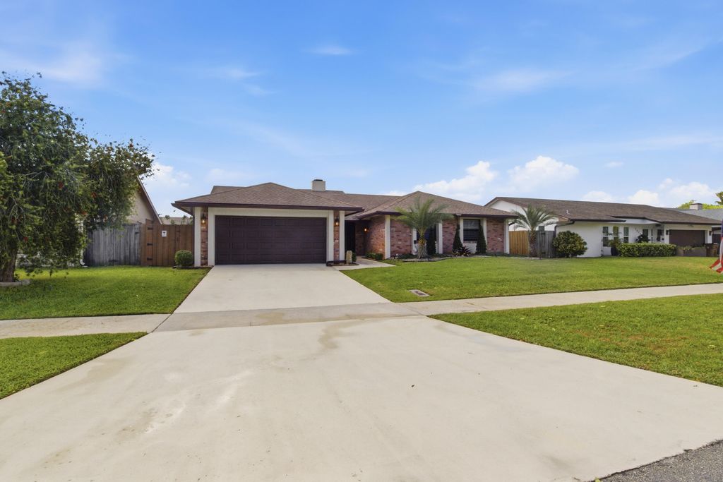 Photo of 2658 SW 11th Place N, Deerfield Beach, FL 33442 (MLS # B26007020)