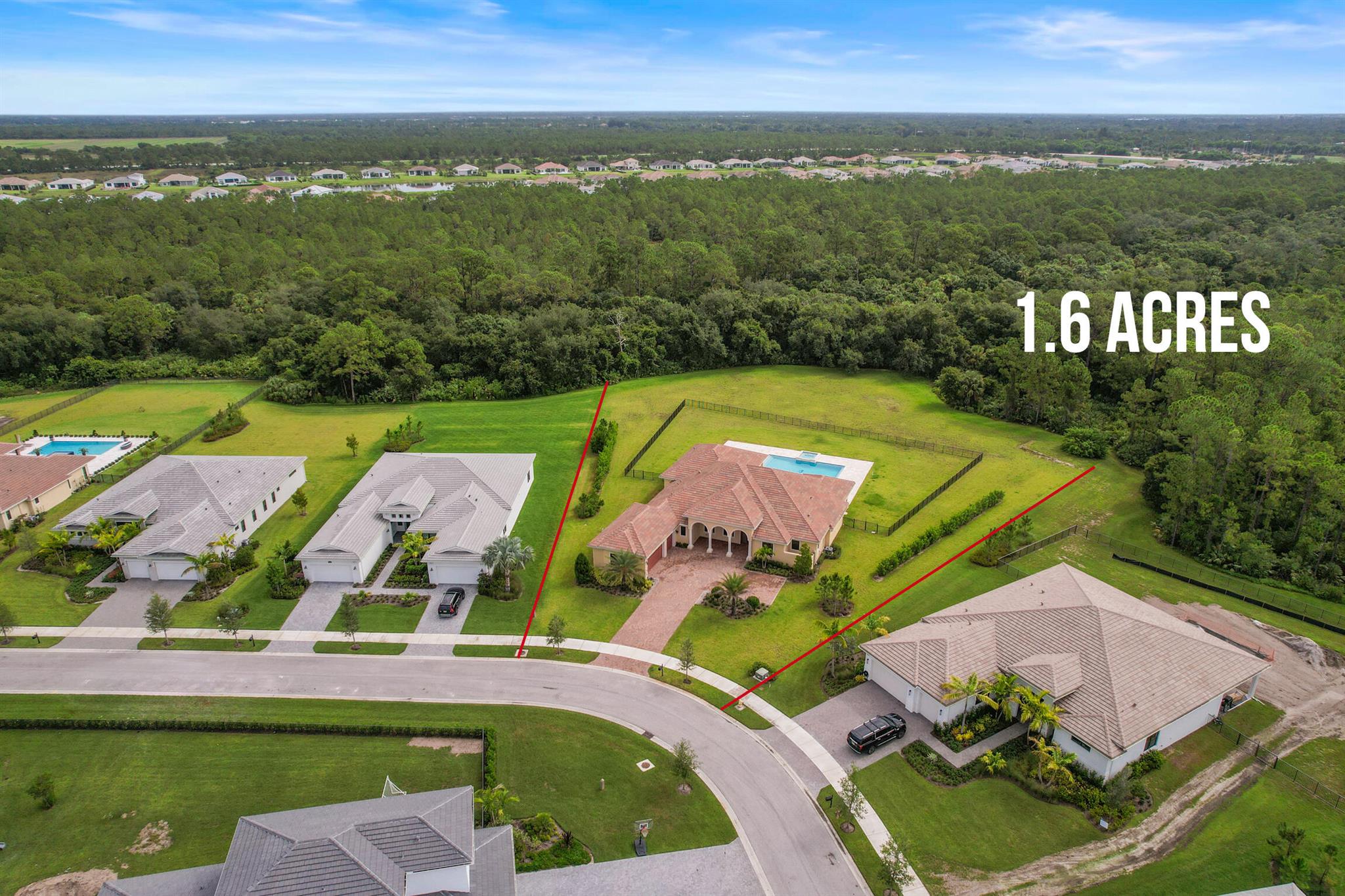 A ONE-OF-A-KIND opportunity to own 1.65 acres backing to a tranquil preserve in the prestigious, gated community of Canopy Creek! This 2023 custom Dahlia model features over $200,000 in builder upgrades, a stunning saltwater pool with premium lighting package, 12' ceilings, hurricane-impact glass, and a private well for irrigation. The open layout offers 4 BR + a dedicated office, blending privacy, flexibility, and modern luxury. A spacious gourmet kitchen that is perfect for entertaining and everyday living. Live the Canopy Creek lifestyle w/ exclusive access to the clubhouse, resort-style pool, fitness center, tennis and pickleball, scenic hiking trails, and year-round social events. Ideally located near top-rated Martin County schools, shopping, dining and 95 and the FL TPKE.
