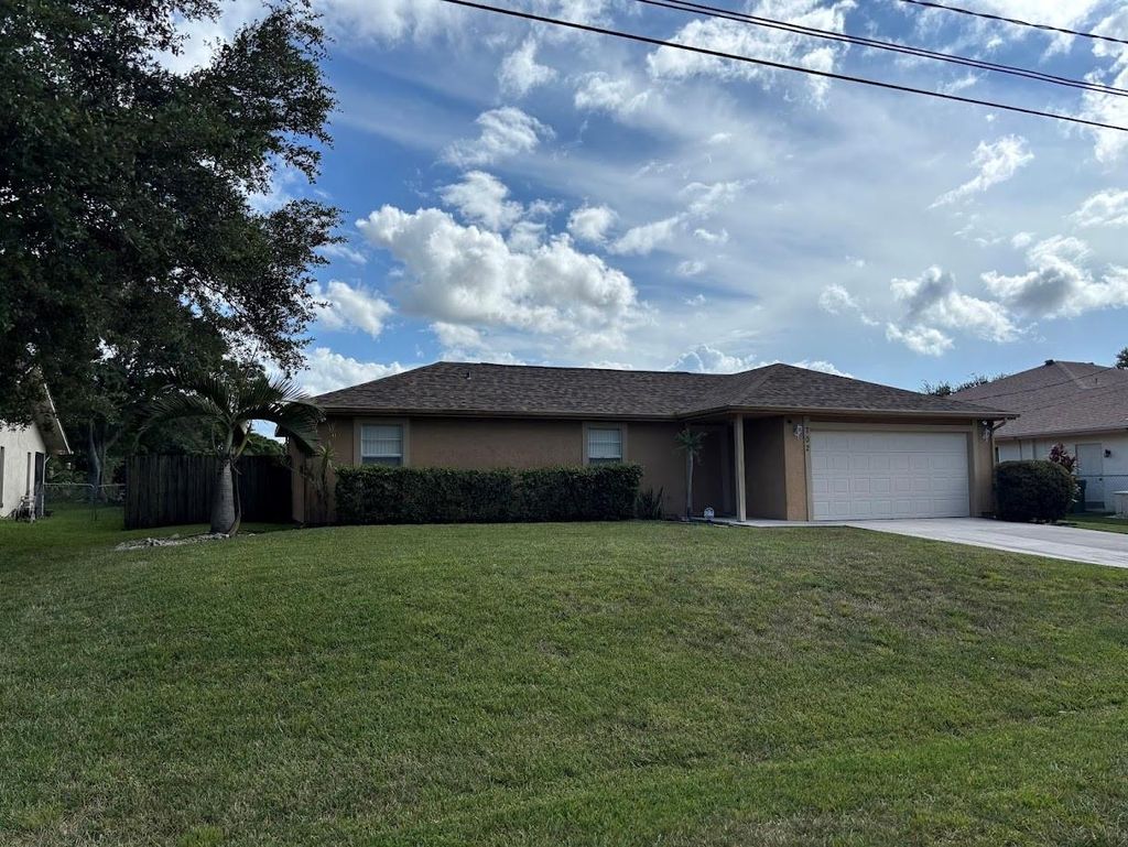 Photo of 702 SW College Park Rd, Port St Lucie, FL 34953 (MLS # F10521279)