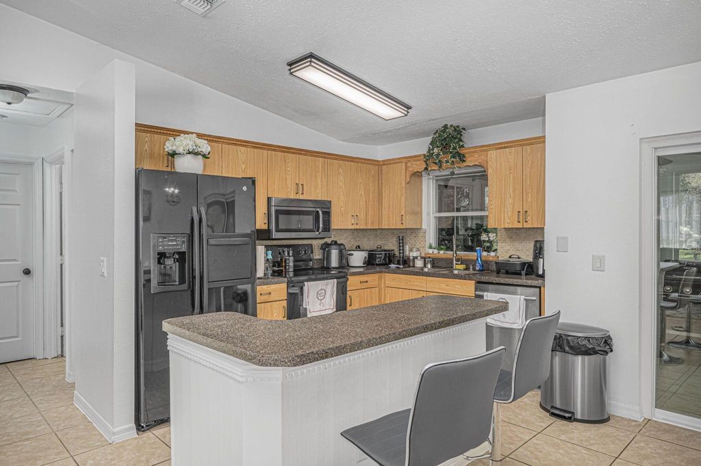 Photo of 1483 SW Del Rio Boulevard, Port Saint Lucie, FL 34953 (MLS # R10949624)