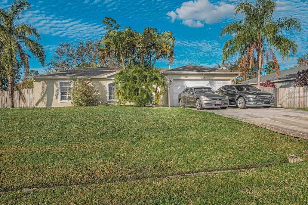 Photo of 1483 SW Del Rio Boulevard, Port Saint Lucie, FL 34953 (MLS # R10949624)