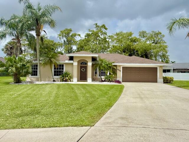 Welcome home to this spacious 4/2 nestled in the desirable Crestwood Cove community. Located on a peaceful cul-de-sac, this home offers a split bedroom plan ideal for privacy and comfort. The kitchen features brand new appliances with a large adjacent laundry room offering additional convenience and storage. The primary bedroom includes laminate flooring, while the other bedrooms are comfortably carpeted. The main living area is tile throughout and easy to maintain.Step outside to enjoy the oversized, private backyard. Perfect for quality time with family or entertaining friends in a tranquil setting. Complete with outdoor lights and place for a hammock this yard will surely become a family favorite. Owner takes care of lawn maintenance. Close to tons of restaurants and shopping.
