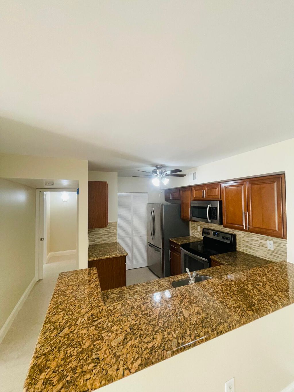 Photo of 1743 Village Boulevard #107, West Palm Beach, FL 33409 (MLS # R11168385)