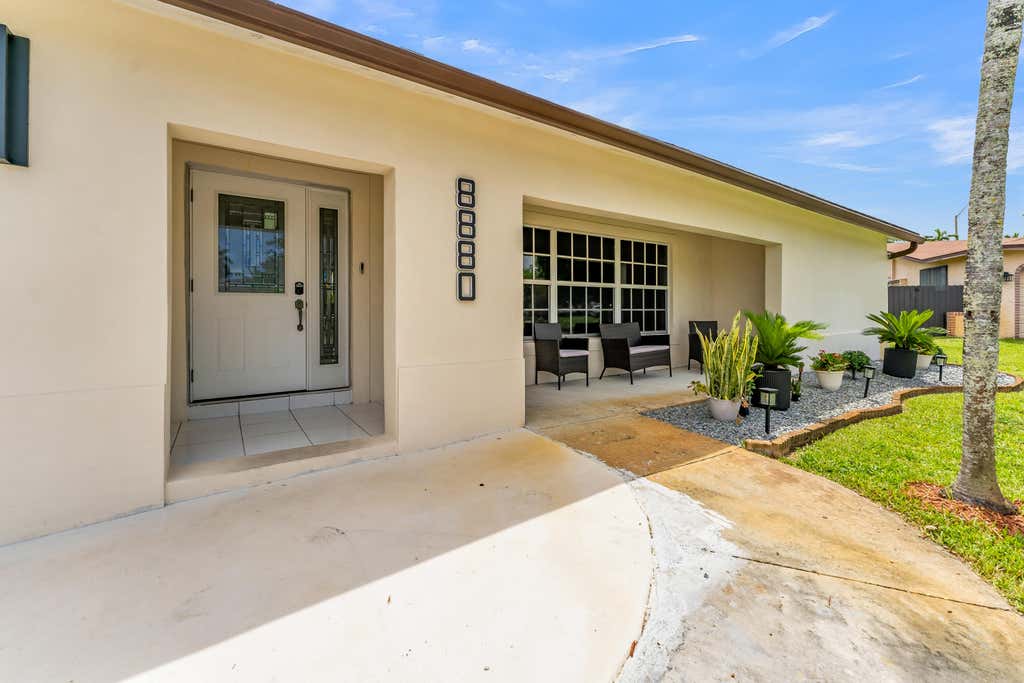 Photo of 8880 NW 7TH Street, Pembroke Pines, FL 33024 (MLS # B26053345)