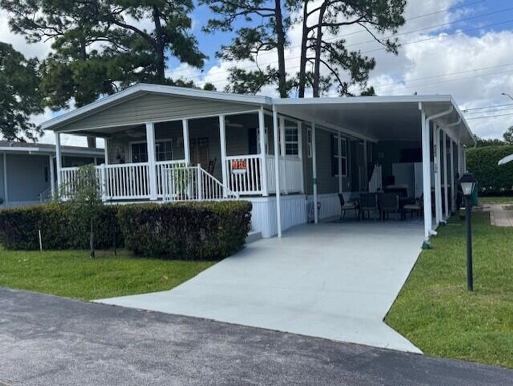 Photo of 4209 Royal Manor Boulevard #136, Boynton Beach, FL 33436 (MLS # B26014922)