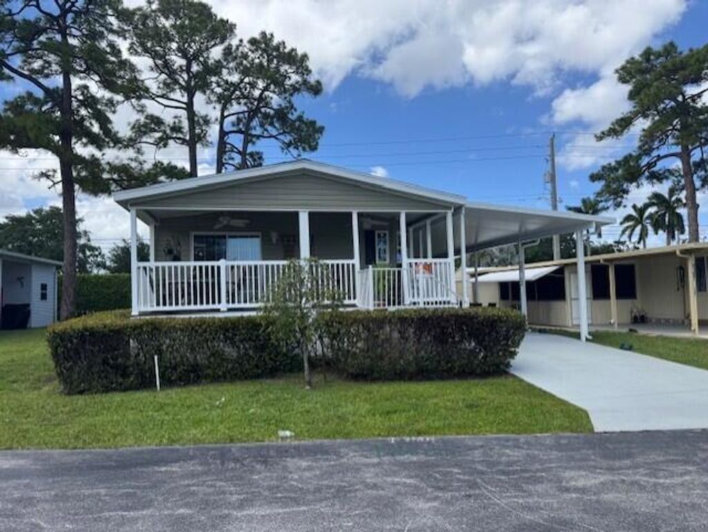 Photo of 4209 Royal Manor Boulevard #136, Boynton Beach, FL 33436 (MLS # B26014922)
