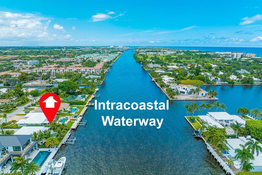 DIRECT INTRACOASTAL WATERFRONT PROPERTY. Enjoy the boating lifestyle in this rare East Delray home on the Intracoastal Waterway ideal for fishing & boating with 75 feet of prime water frontage, private dock & 16,000 lbs. boat lift. INSTANT INCOME OPPORTUNITY! Choose waterfront living or Airbnb vacation rental income. Move-in-ready with 2 bedrooms, 2 baths, gated property with parking for 5 cars. Nestled in the all-ages Tradewinds Estates with builder-friendly zoning for new construction with no HOA rules or fees. Enjoy the passing yachts from your own heated waterfront pool and covered patio perfect for entertaining under the pergola. Sandy beaches, fine dining, shops & vibrant nightlife on Delray's Atlantic Ave awaits just 2.5 miles away. Some photos are virtually staged.