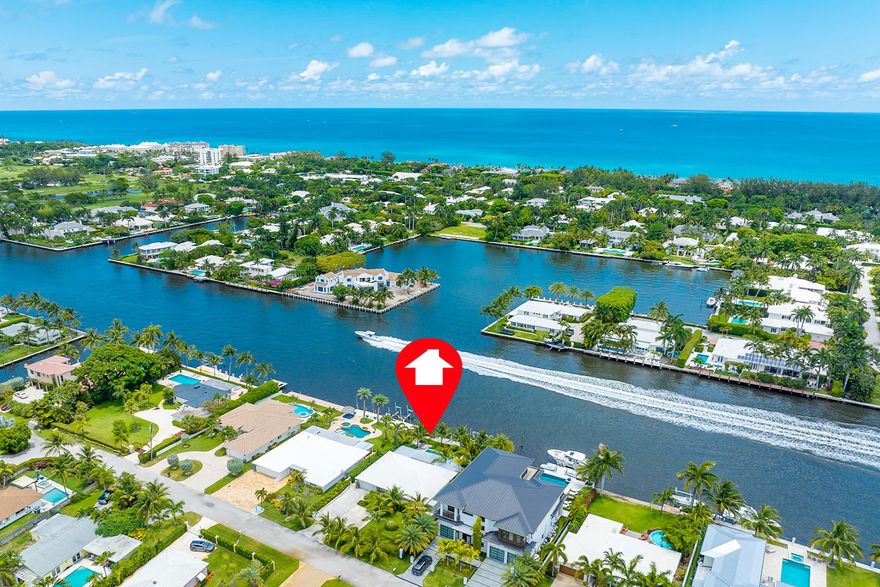 NEW PRICE! DIRECT INTRACOASTAL WATERFRONT PROPERTY. Enjoy the boating lifestyle in this rare East Delray home on the Intracoastal Waterway ideal for fishing & boating with 75 feet of prime water frontage, private dock & 16,000 lbs. boat lift. 

INSTANT INCOME OPPORTUNITY - Airbnb! Choose waterfront living or Airbnb vacation rental income. Move-in-ready with 2 bedrooms, 2 baths, gated property with parking for 5 cars. 

Nestled in the all-ages Tradewinds Estates with builder-friendly zoning for new construction with no HOA rules or fees. 

Enjoy the passing yachts from your own heated waterfront pool and covered patio perfect for entertaining under the pergola. Sandy beaches, fine dining, shops & vibrant nightlife on Delray's Atlantic Ave within 2.5 miles. Some photos are virtually st Discover an unparalleled boating lifestyle in this rare Intracoastal waterfront gem at 3211 Karen Drive in East Delray Beach, offering panoramic water views of Polo Cove across from the multi-million-dollar estates of Gulf Stream Florida. With 75 feet of prime seawall frontage, the property features a private dock for fishing, a 16,000-lb boat lift, and a heated pool with sun shelf that creates a true resort-style backyard oasis ideal for entertaining and relaxation.

Nestled in Tradewinds Estates with NO HOA and builder-friendly zoning in unincorporated Palm Beach County, the property benefits from public water and sewer and county-only permitting, avoiding city restrictions. These streamlined codes make renovation or future redevelopment significantly smoother for builders and investors.

The oversized 11,400+ sq ft lot offers a blank canvas for a grand two-story estate or modern villa. South Florida waterfront land is increasingly scarce, making this a high-equity opportunity for savvy buyers seeking ocean access, no-bridge boating, and valuable zoning flexibility in a premium coastal location.

This home delivers a resort-style boating lifestyle today with the freedom to build your dream home tomorrow. Whether you're a waterfront enthusiast, investor, or luxury builder, this is one of the last unencumbered Intracoastal parcels in a coveted East Delray enclave.

Enjoy direct deep-water Intracoastal access with nearby ocean access, an ideal launch point for fishing, cruising, and watersports. World-class golf, tennis, dining, and Atlantic Avenue entertainment are minutes away. The ultra-quiet Tradewinds neighborhood has only one entry road and no drive-through traffic, making it perfect for walking, jogging, or biking. Experience the ultimate Florida waterfront lifestyle and endless possibilities.
