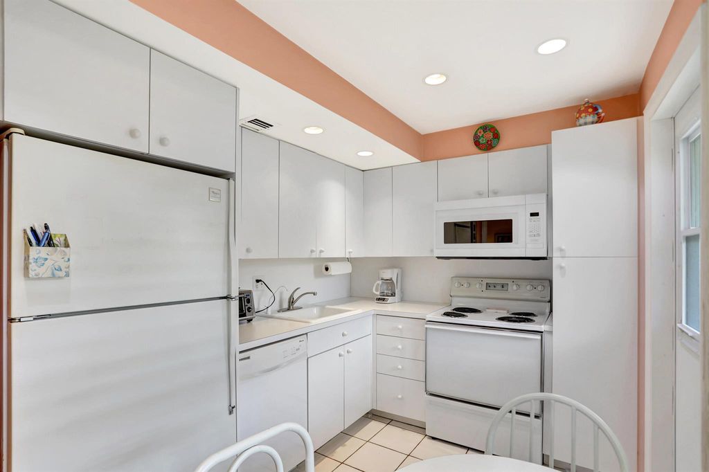 Photo of 2661 S Course Drive #103, Pompano Beach, FL 33069 (MLS # R10953930)