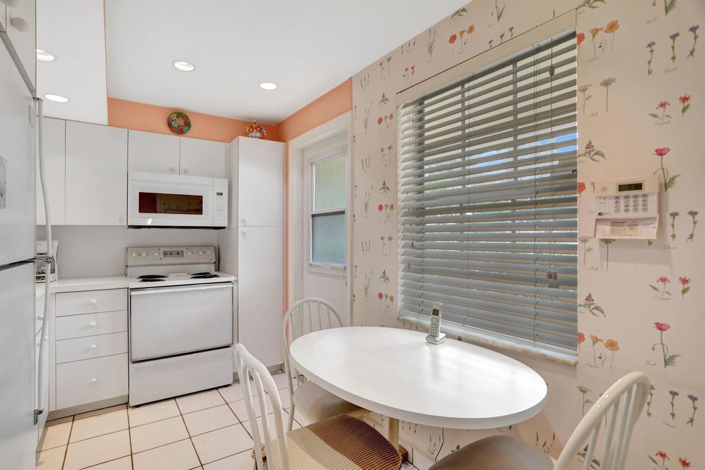 Photo of 2661 S Course Drive #103, Pompano Beach, FL 33069 (MLS # R10953930)