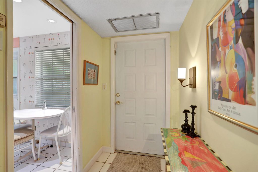 Photo of 2661 S Course Drive #103, Pompano Beach, FL 33069 (MLS # R10953930)