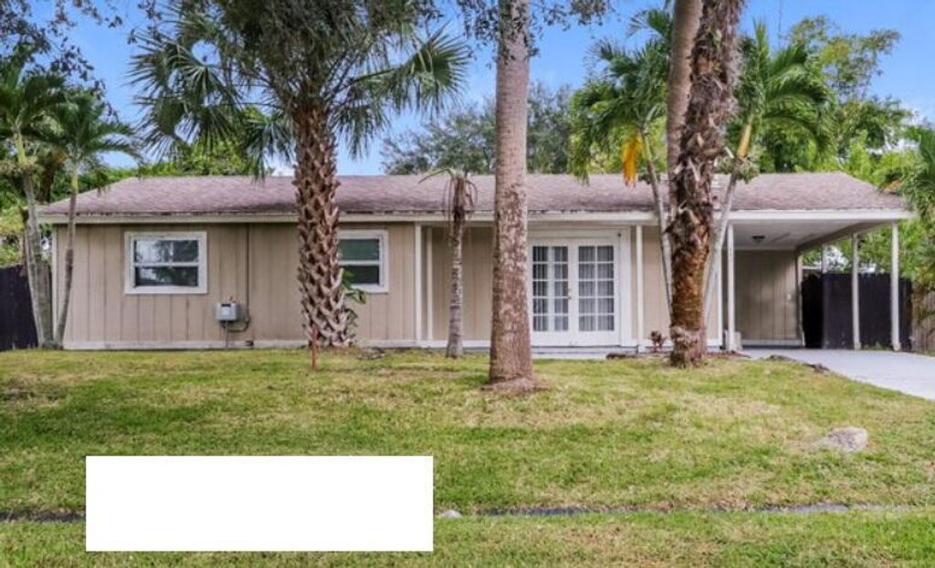 Photo of 1061 SW Estaugh Avenue, Port Saint Lucie, FL 34953 (MLS # R10759024)