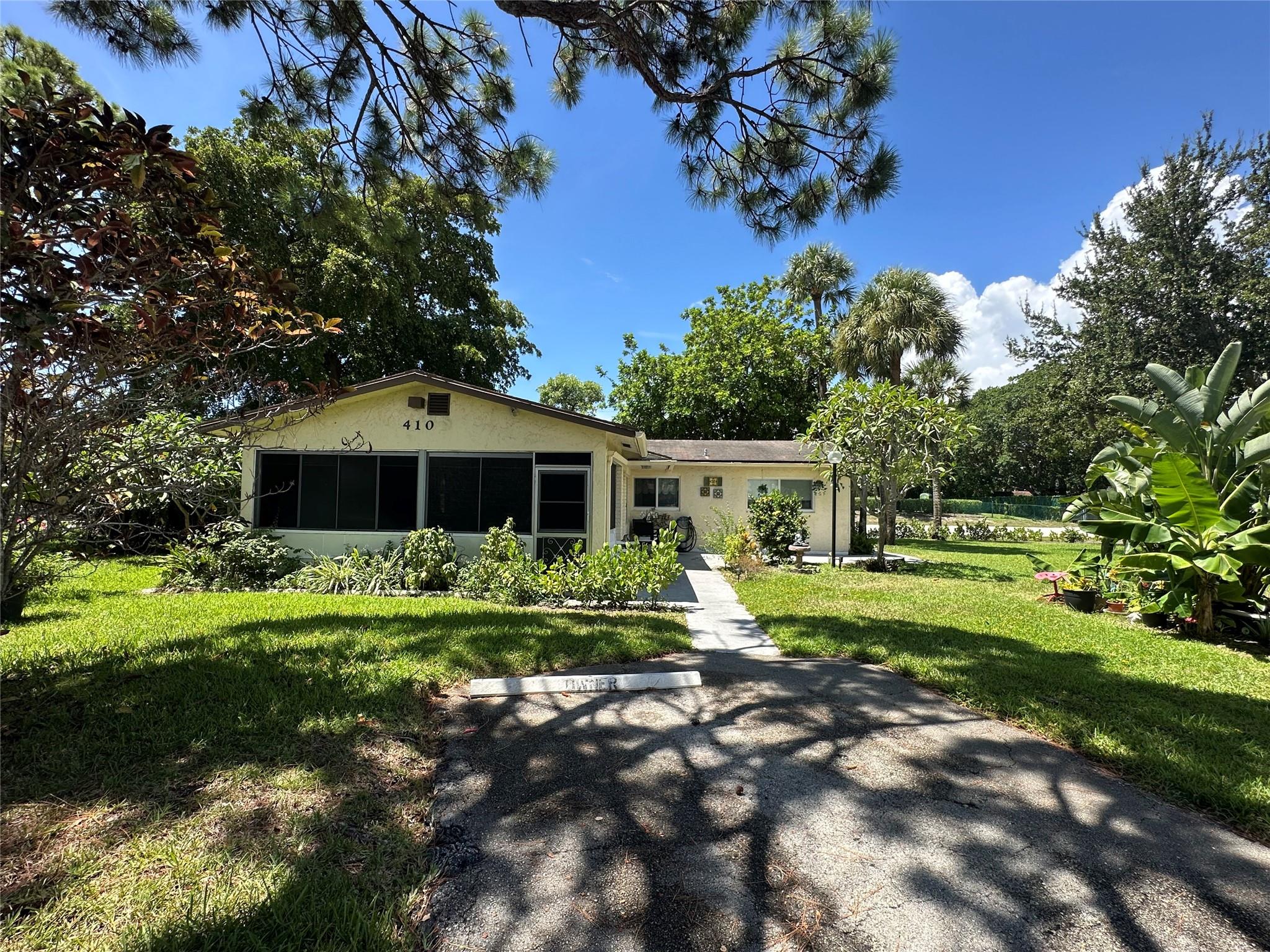 This updated single family home is conveniently located near the beach area in the active 55+ pet friendly (15 lbs) community of NATURA. Walk past the inviting front patio with a nice garden view and enter the open great room adjacent to the updated kitchen with a breakfast bar and oversize pantry. There is also an enclosed screened porch off the living room for you to enjoy the wonderful Florida lifestyle or make another bedroom. Additional features include impact windows and doors, tile floors in the living areas, a split bedroom floor plan, inside laundry room with a full size washer and dryer, plus a private rear patio that is perfect for BBQ's. The community also offers pool and clubhouse with a fitness center and library. Basic cable, landscaping, water & trash included maintenance