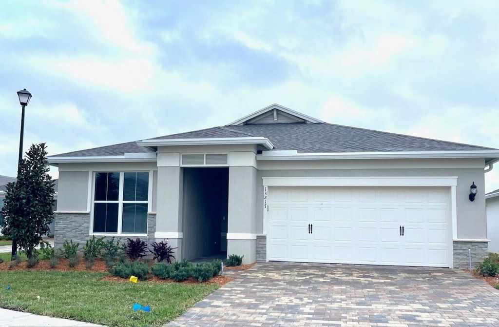 Photo of 13217 SW Calita Way, Port Saint Lucie, FL 34987 (MLS # R11017628)