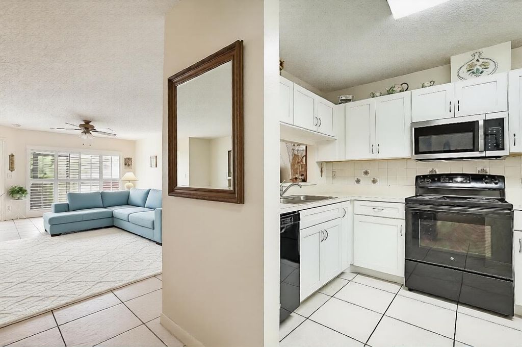 Photo of 405 Harbour Pointe Way, Greenacres, FL 33413 (MLS # R11033646)