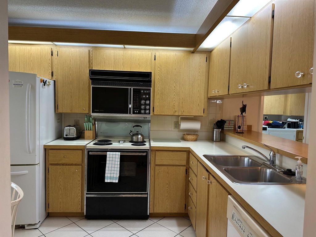 Photo of 2201 Marina Isle Way #206, Juno Beach, FL 33408 (MLS # R11055066)