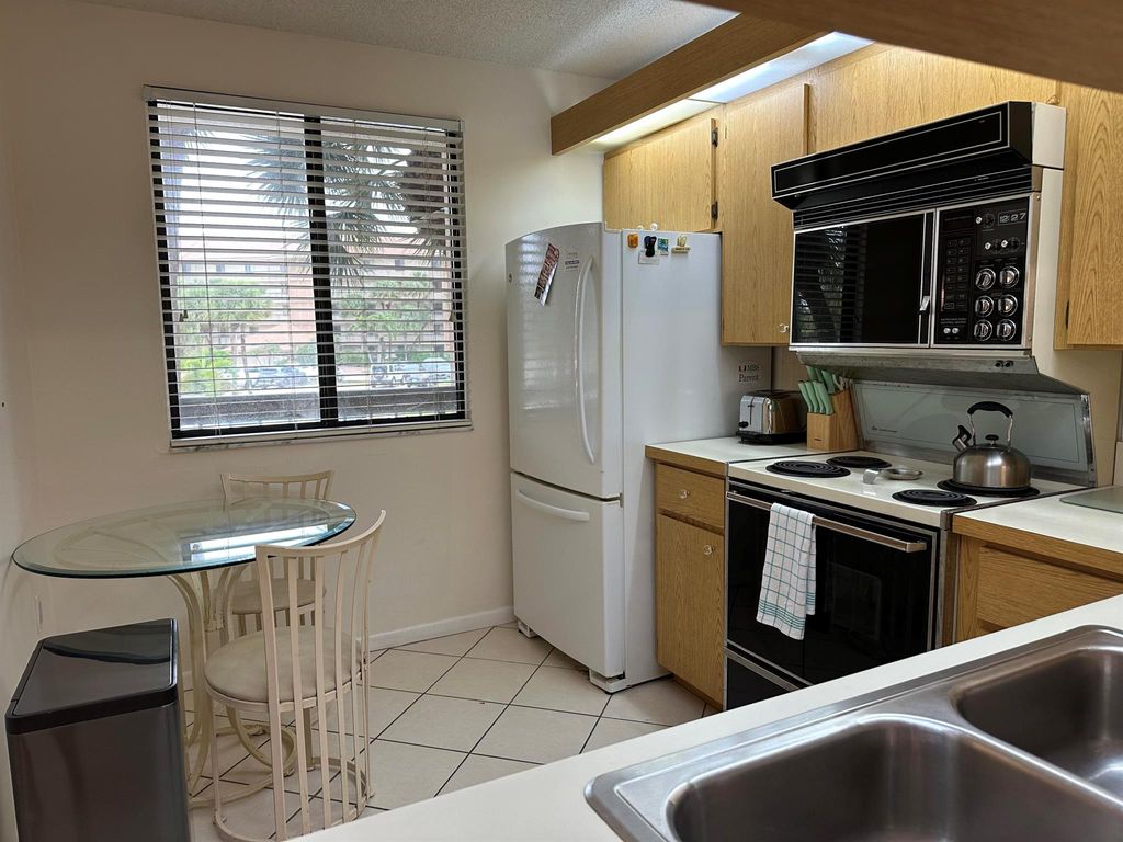 Photo of 2201 Marina Isle Way #206, Juno Beach, FL 33408 (MLS # R11055066)