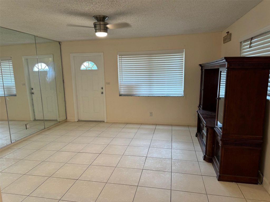 Photo of 4564 NW 16th Avenue, Tamarac, FL 33309 (MLS # B26016016)