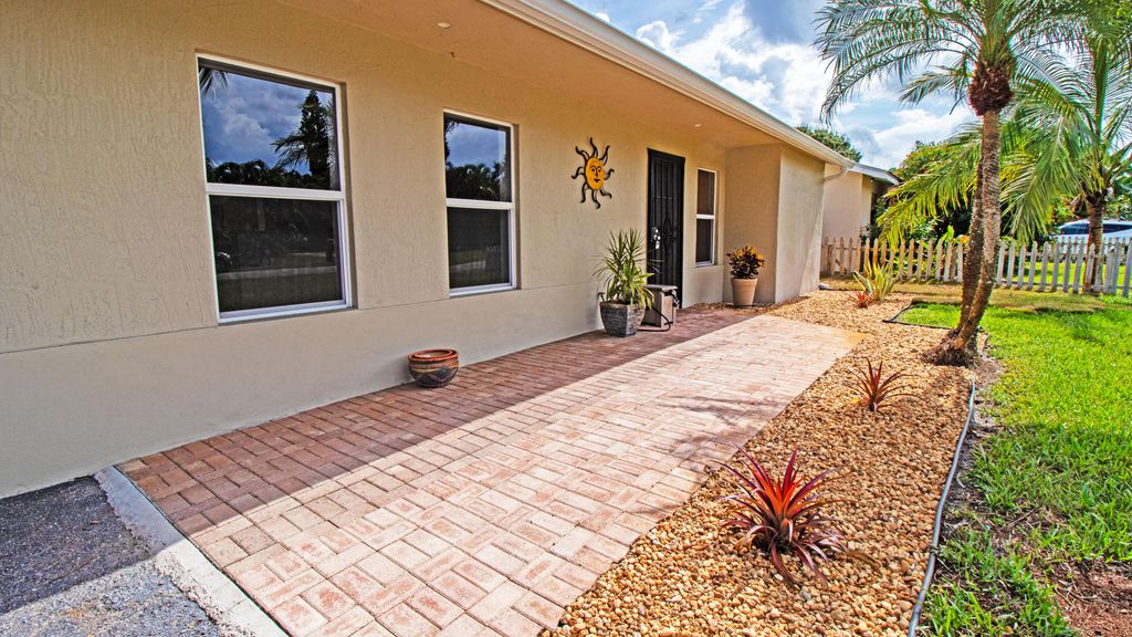 Photo of 8804 SE Jardin Street, Hobe Sound, FL 33455 (MLS # R11012450)