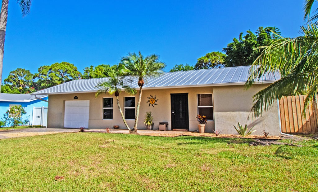 Photo of 8804 SE Jardin Street, Hobe Sound, FL 33455 (MLS # R11012450)