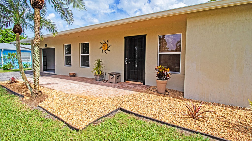 Photo of 8804 SE Jardin Street, Hobe Sound, FL 33455 (MLS # R11012450)