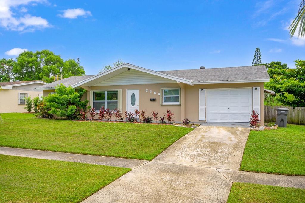 Photo of 3266 Florida Blvd, Palm Beach Gardens, FL 33410 (MLS # R11002366)