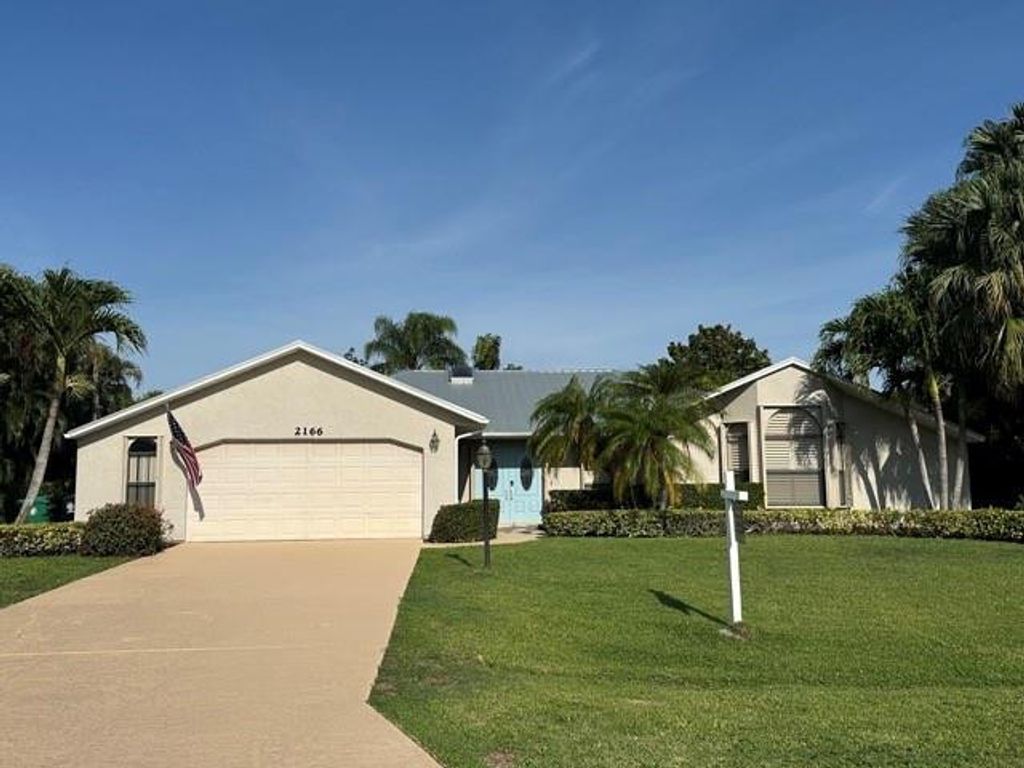 Photo of 2166 SE Bersell Road, Port Saint Lucie, FL 34952 (MLS # F10506581)