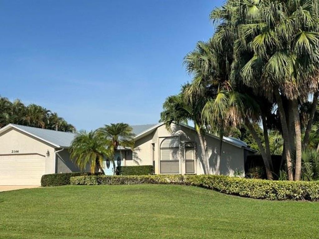 Photo of 2166 SE Bersell Road, Port Saint Lucie, FL 34952 (MLS # F10506581)