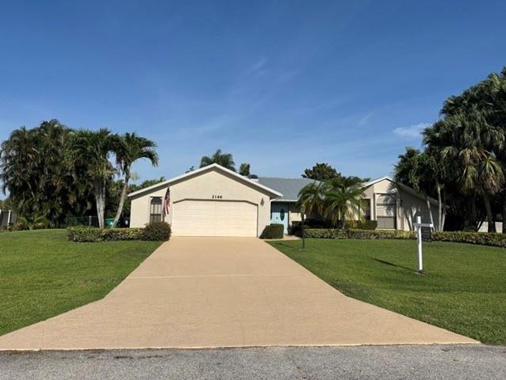 Photo of 2166 SE Bersell Road, Port Saint Lucie, FL 34952 (MLS # F10506581)