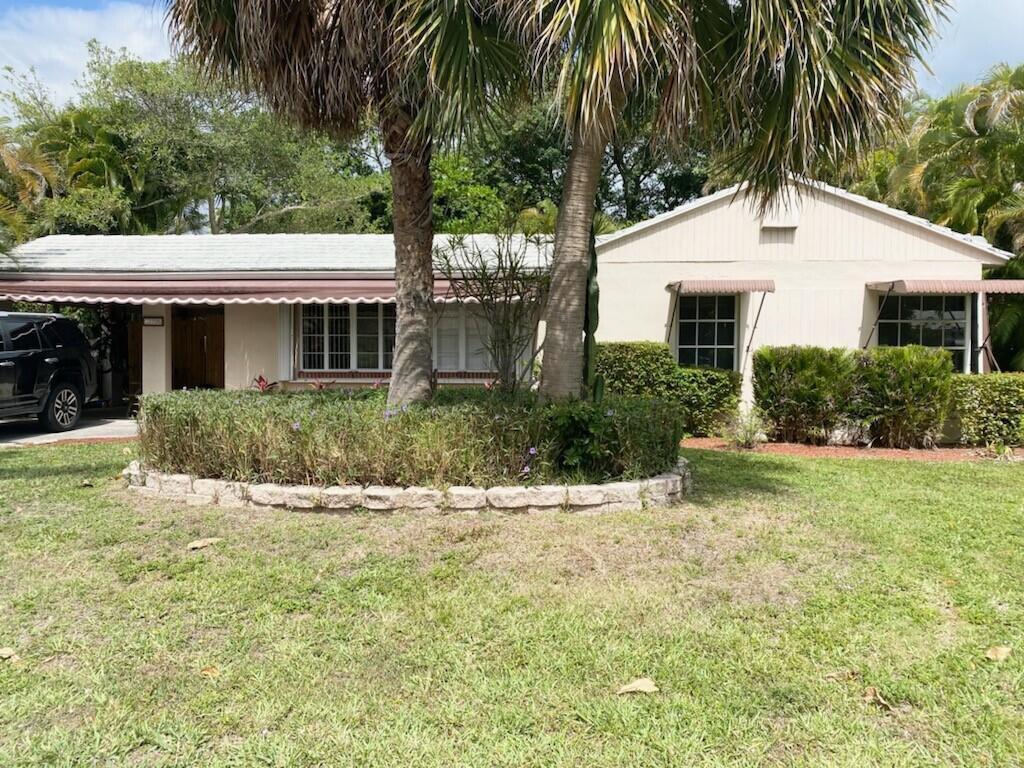 Walk to the beach and restaurants from this charming home!!!! 2 bedroom, 1 bathroom single family home WITH AMAZING TROPICAL BACKYARD. This beach home has TONS OF POTENTIAL and is located in the village of Palm Beach Shores. Palm Beach Shores is a quant oceanside community located only a short distance from downtown West Palm Beach Singer Island and Palm Beach Gardens. This charming Florida home is a short stroll to Sailfish Marina and is just blocks from the Palm Beach Shores Private Deeded Beach w/a manned lifeguard station. Pet friendly neighborhood! Come make this spectacular with a little TLC.