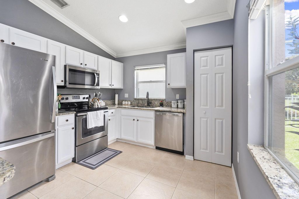 Photo of 475 SW Talquin Lane, Port Saint Lucie, FL 34986 (MLS # R11110842)