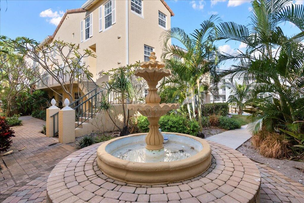 Photo of 1015 Lake Shore Drive #105, Lake Park, FL 33403 (MLS # R11142285)