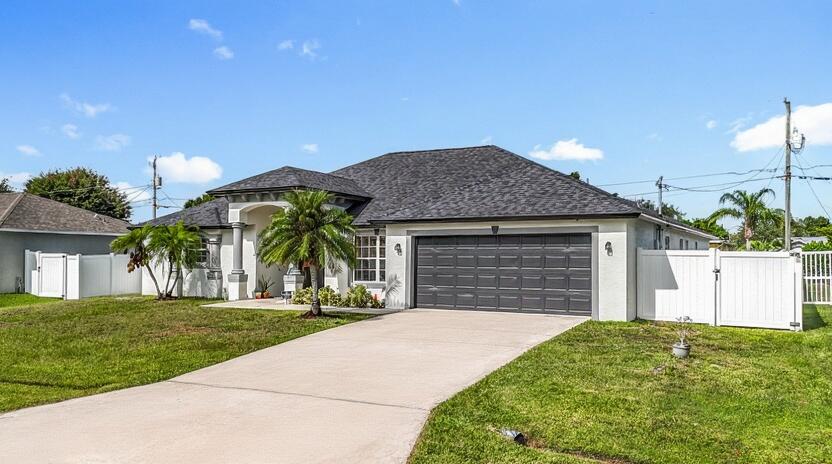 Photo of 3862 SW Kocerik Street, Port Saint Lucie, FL 34953 (MLS # R11121809)