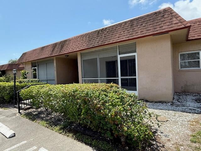 Photo of 1906 Palmland Drive #D, Boynton Beach, FL 33436 (MLS # R11094009)