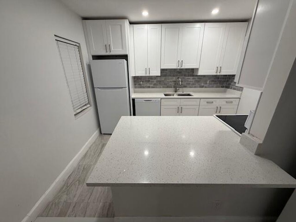 Photo of 1906 Palmland Drive #D, Boynton Beach, FL 33436 (MLS # R11094009)