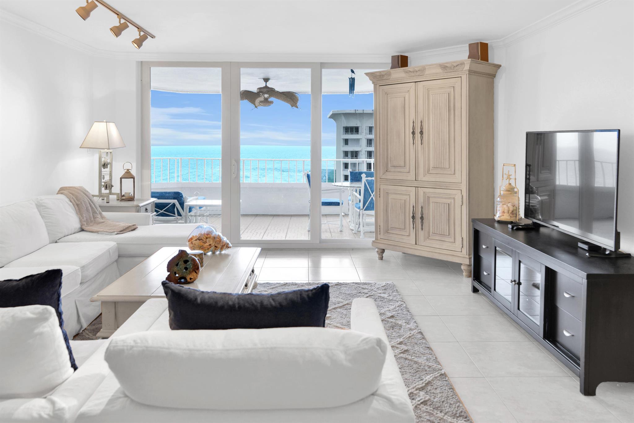 Stunning ocean-to-Intracoastal views from every room in this 22nd-floor condo featuring a split-bedroom layout and a spacious balcony perfect for outdoor dining and entertaining. Includes a separate dining room and two generously sized bedrooms, each with its own en-suite bathroom. Located in a resort-style, beachfront building offering top-tier amenities such as a 24-hour attended lobby, oceanfront pool, hot tub, picnic and grilling areas, state-of-the-art fitness center, modern social lounges, library, two tennis/pickleball courts, and a ping pong room.