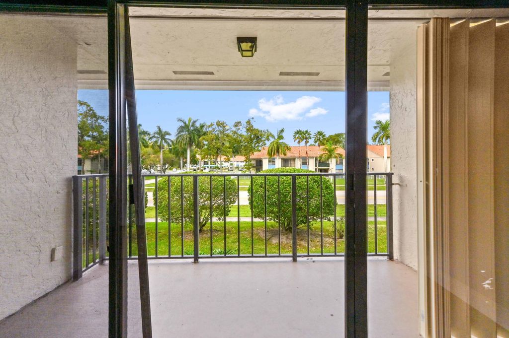 Photo of 1445 Lake Crystal Drive #F, West Palm Beach, FL 33411 (MLS # B26016123)