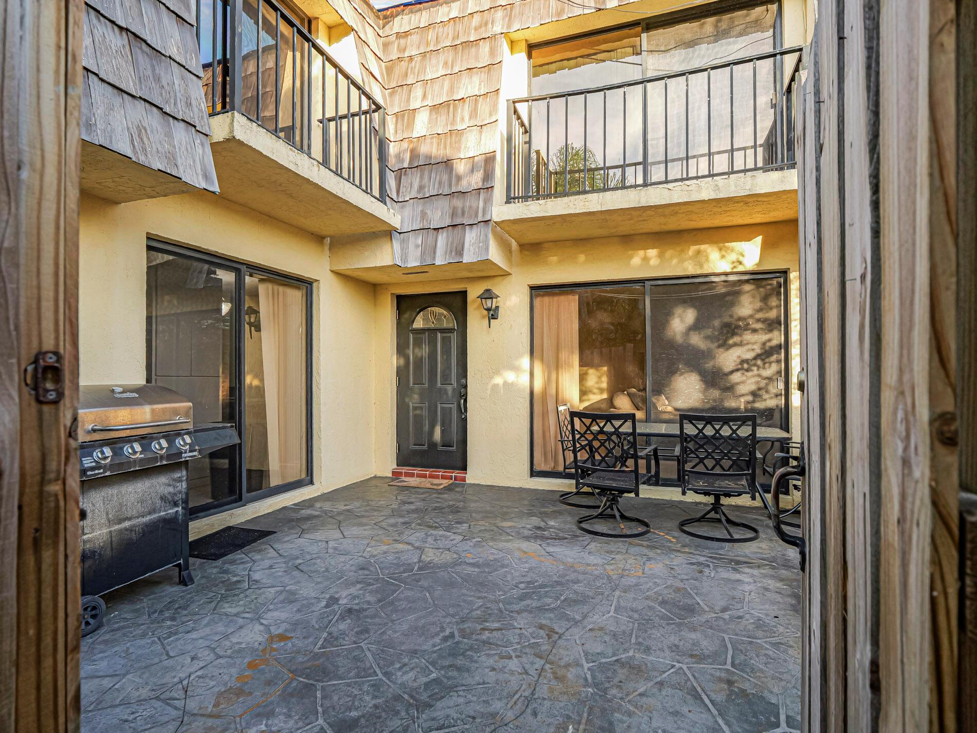Beautifully updated 2-bedroom, 2.5 bathroom, 2-level townhome in Tropic Villas North with 2024 air conditioner and 2025 roof. Features a fenced, private patio, large living room, dining room, updated kitchen, laundry room and upstairs - master bedroom with walk in closet and full bath, second bedroom and hall bath. Community has a heated pool and is just minutes from shops and beaches!