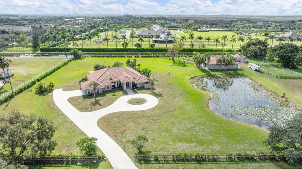 Photo of 15360 Estancia Lane, Wellington, FL 33414 (MLS # R11145296)