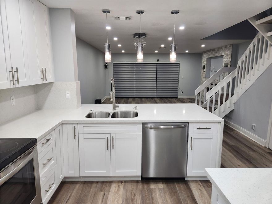 Beautifully updated townhouse located in the desirable Township of Coconut Creek. This home features 2 master suites with walk-in closets and 2.5 bathrooms. Features motorized zebra blinds, luxury vinyl plank flooring, LED recessed lighting, and a custom media wall for a TV up to 75” with electric fireplace and Samsung soundbar. The kitchen offers quartz countertops, 42" cabinets, stainless steel appliances, lazy Susan, and built-in soap dispenser. Recently remodeled bathrooms feature quartz vanities and rainfall showerheads. Tankless water heater and cable TV included. Prime location within walking distance to the Casino, shopping, & dining. Move-in special: FREE FIRST MONTH & NO LAST MONTH DEPOSIT with a low move-in fee of $4,350. This is an INSTANT saving deal without paying 3x the rent