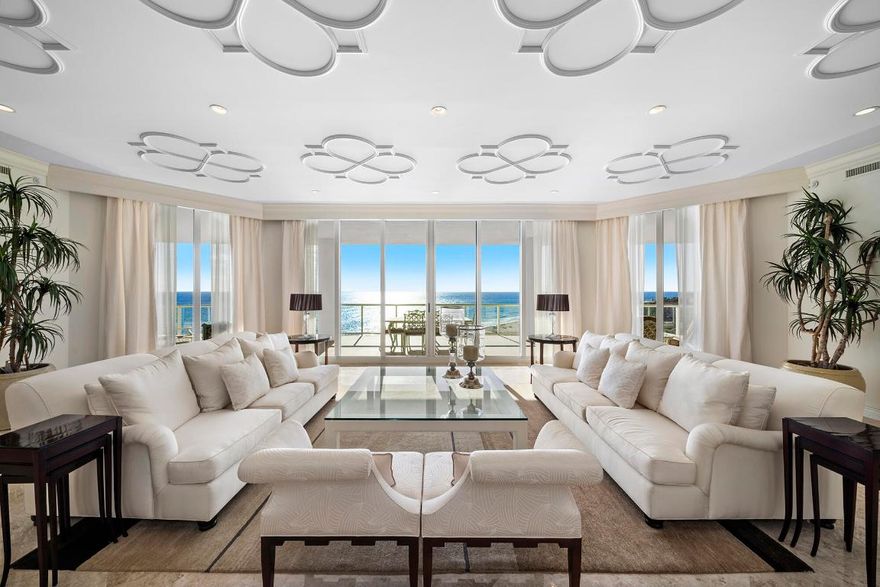 WELCOME HOME!  This meticulously maintained Tower Suite unit is truly a beacon of sophistication. Experience unparalleled luxury at the most coveted address on Singer Island. This Ritz-Carlton Residence Tower Suite, one of only six, offers 7,445 Sqft. of lavish living space and 1,735 Sqft. of balcony terrace space with unobstructed ocean views. Impeccably designed with custom trim work, this residence offers 5 spacious bedrooms + office and 5 1/2 bathrooms. As you enter through your private elevator, the breathtaking direct ocean views afford you an abundance of natural light throughout the entire home. The expansive gourmet kitchen with island is equipped with top-of-the-line stainless steel appliances, pantry, and a separate butler's kitchen. Primary wing features his-and-her baths and an enormous walk-in closet. The unit also includes a formal dining room, living room, and a great room with a bar/wine area. There are four well appointed guest bedrooms offering breathtaking balcony views of the city and intracoastal. Dramatic floor to ceiling impact glass allows peace of mind all year round.
As you step outside on the expansive wraparound  balconies, enjoy ocean, intracoastal and city views. This unit includes 4 designated parking spaces in an ideal location of the garage close to the elevators.

The Ritz-Carlton Residences offer an unmatched luxury lifestyle on 8.8 acres of pristine beachfront. Renowned for the legendary service that defines the Ritz-Carlton brand, residents experience the highest standards of hospitality and personalized attention. Exclusive amenities include two sparkling pools, a private beach, a poolside cafe, state-of-the-art fitness centers, cinema-style theater rooms, a library, and elegant social rooms. Around-the-clock concierge and valet services ensure convenience and comfort at every turn. Additional features such as two private dog parks, guest suites, and a beautifully landscaped pool deck promenade with outdoor grilling stations enhance the community's appeal. The oceanfront infinity-edge pool and an on-site restaurant offering poolside service elevate this exceptional residence into a true haven of sophistication and relaxation.