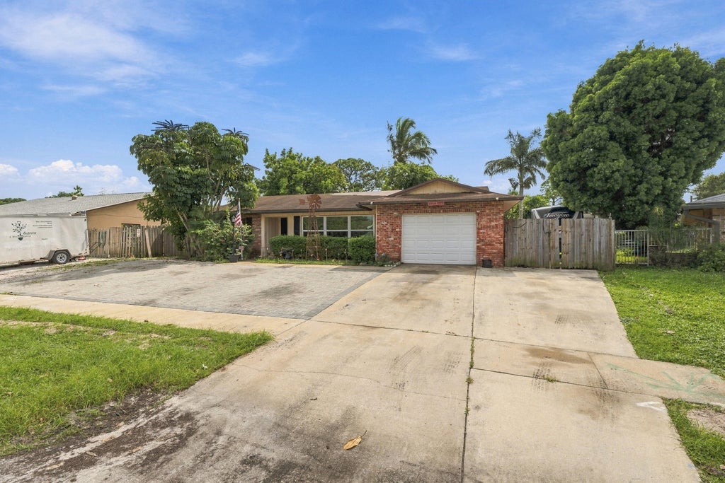 Photo of 1275 Scottsdale Road S, West Palm Beach, FL 33417 (MLS # B26089131)