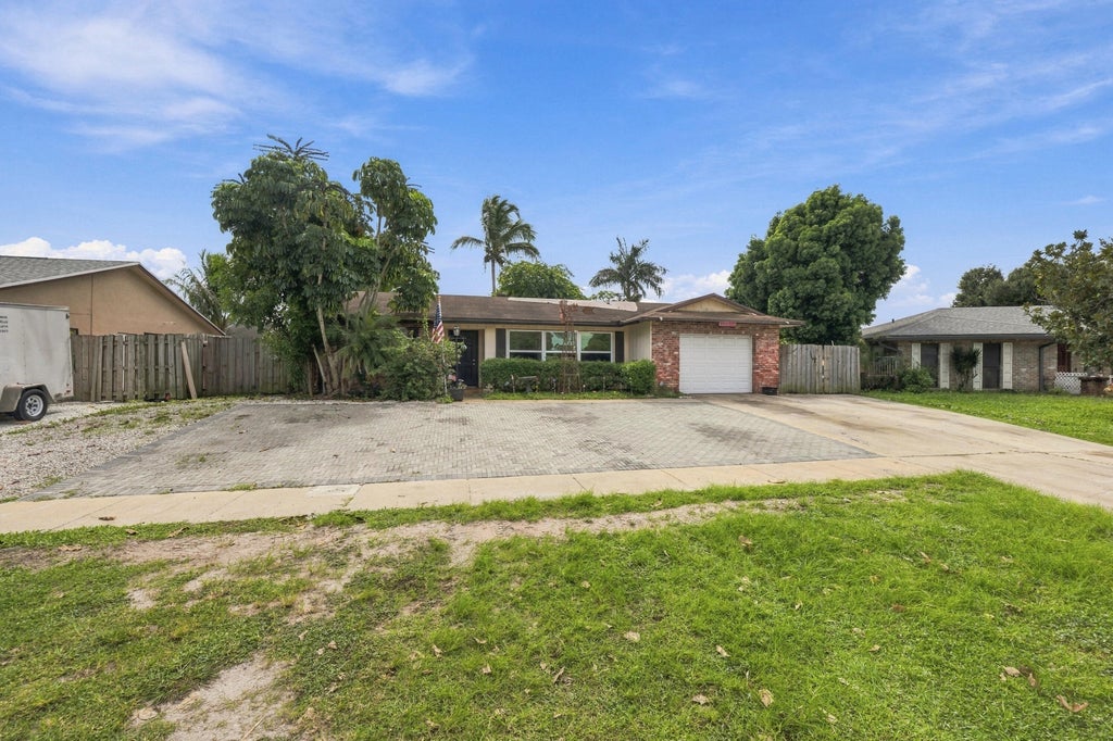 Photo of 1275 Scottsdale Road S, West Palm Beach, FL 33417 (MLS # B26089131)
