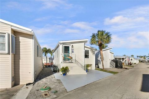 Photo of 1092 Nettles Boulevard, Jensen Beach, FL 34957 (MLS # R11132977)